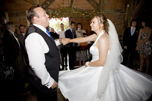 wedding photographer image of bride and groom dancing